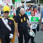 March for Life marchers with signs and walking